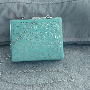 Green and gold small handbag